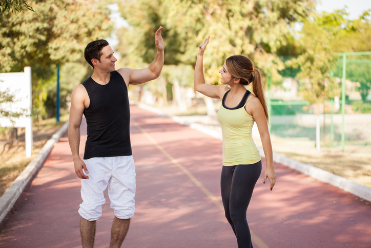 Couple giving each other a high five